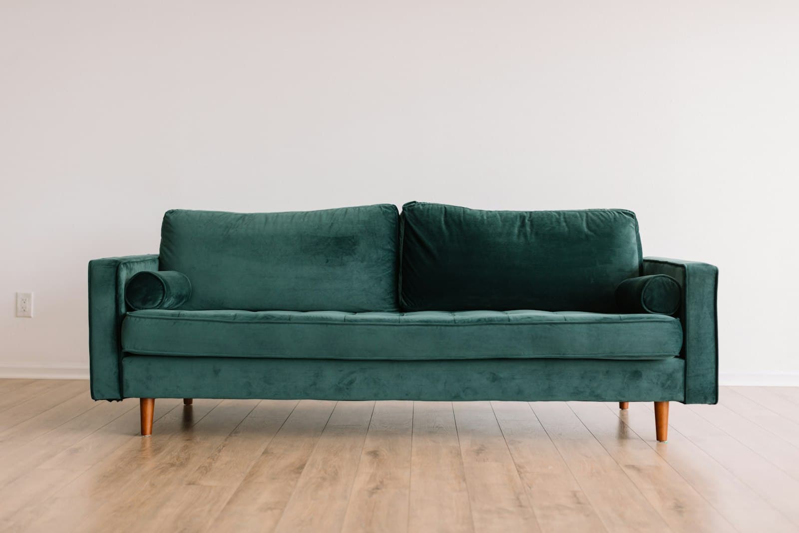 Modern living room with a clean fabric sofa as the focal point